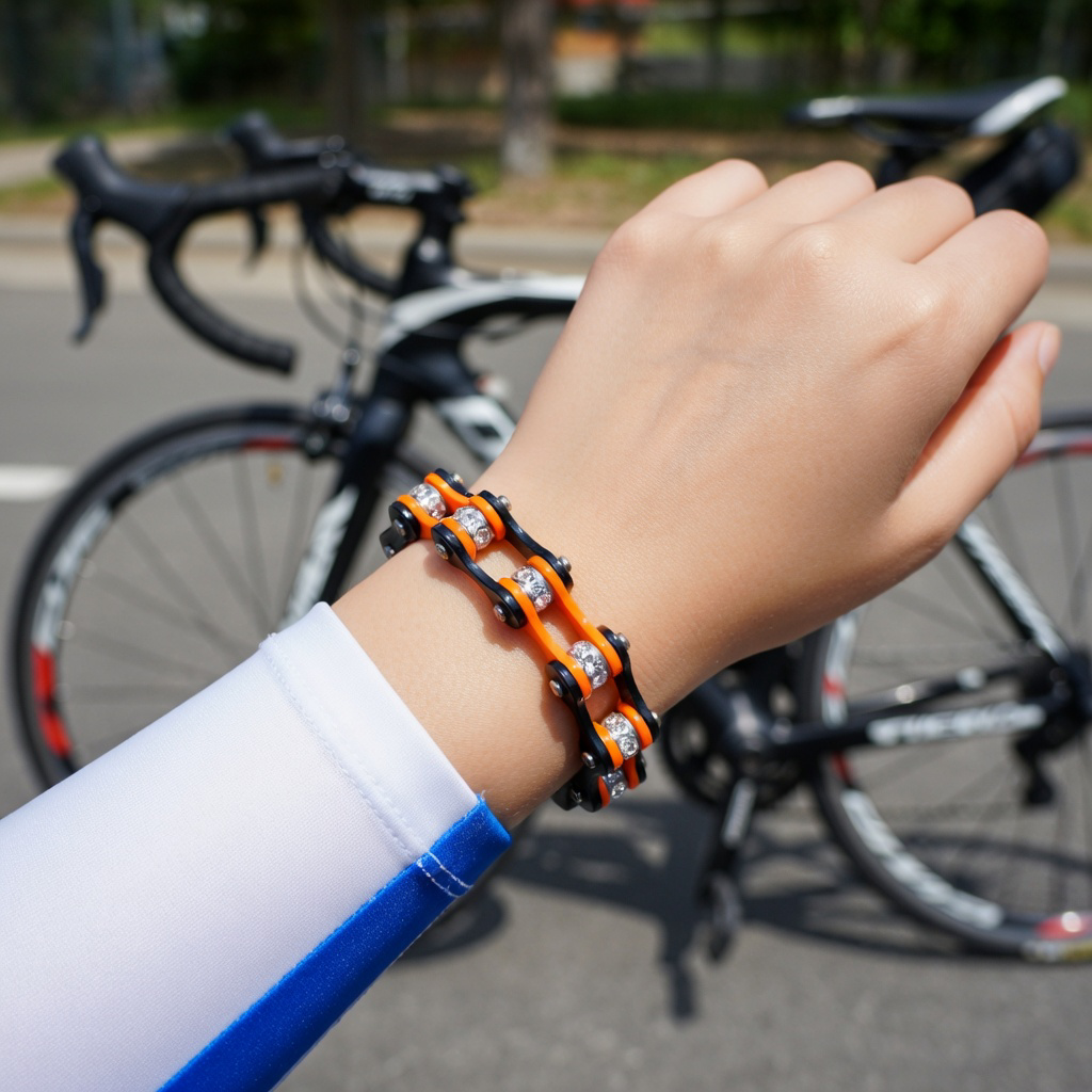 Cycolinks Orange Black Crystal bike chain bracelet lifestyle image