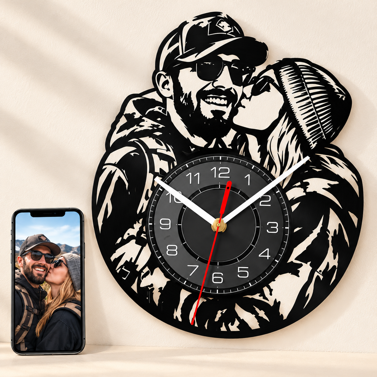 Illustrative Cycolinks custom vinyl portrait wall clock beside a smartphone showing the matching original couple photograph; non-LED example