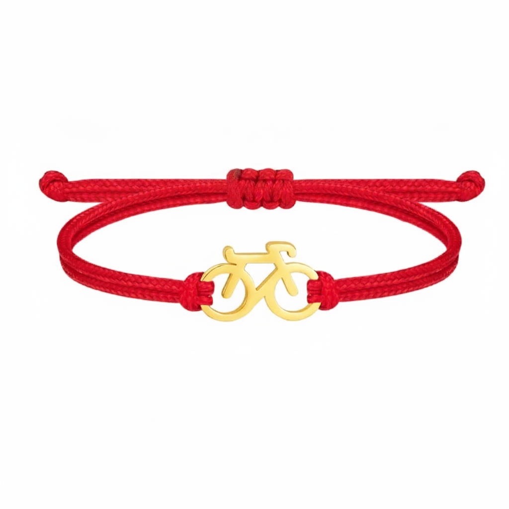 Red bracelet with a gold bicycle charm on a white background