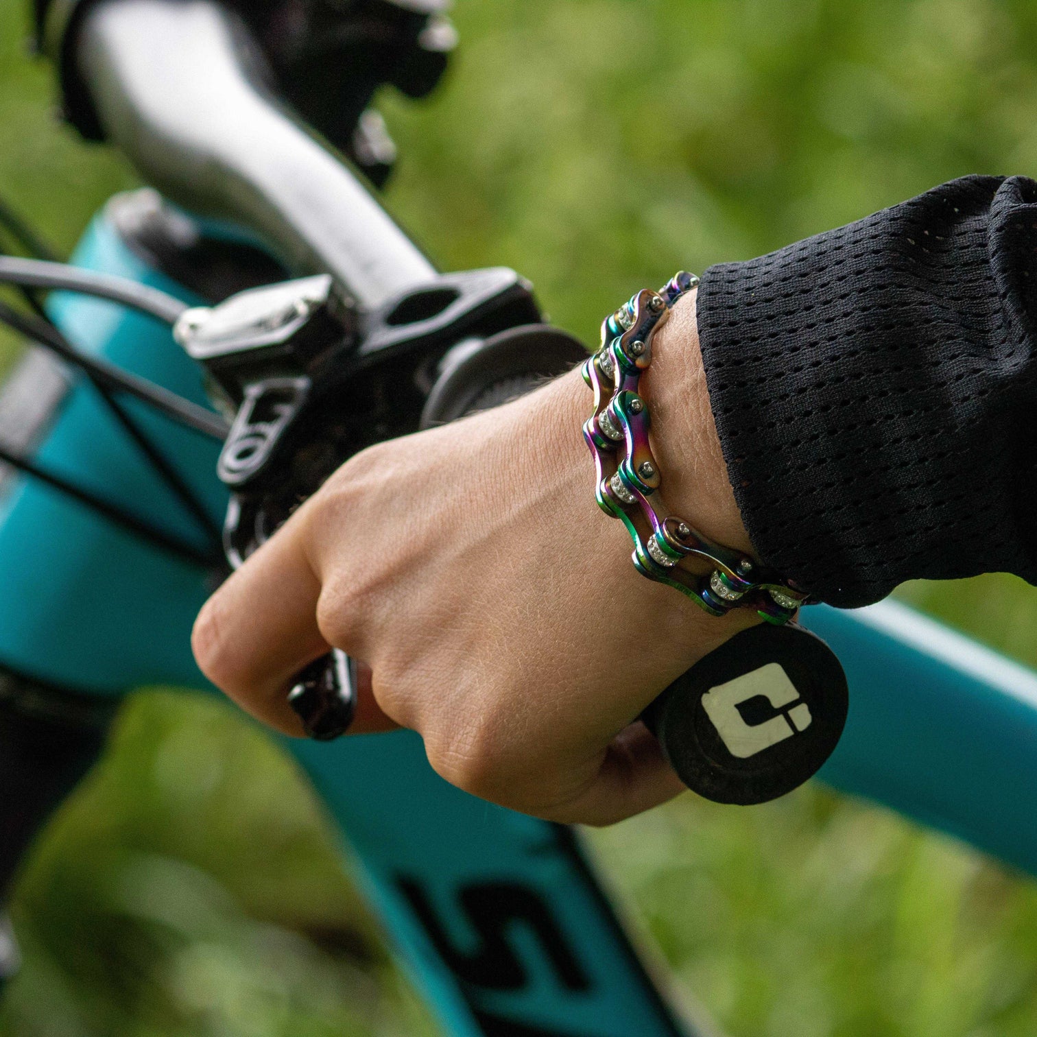 Biker wearing 316L stainless steel bike chain bracelet in active context